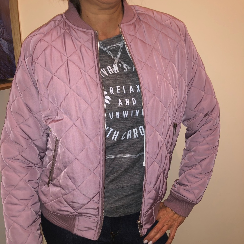 Small lightweight pink jacket never worn!